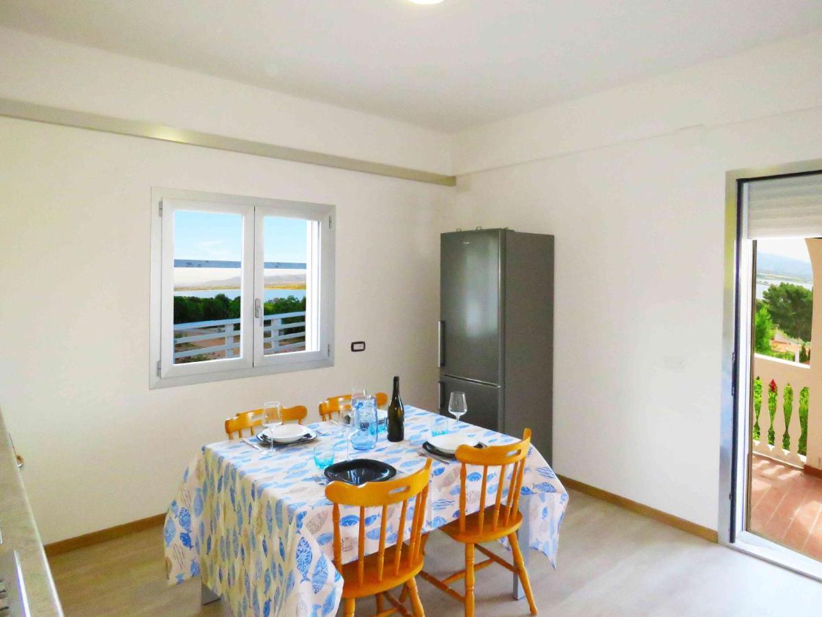 Panohome Porto Pino Buitenkant foto