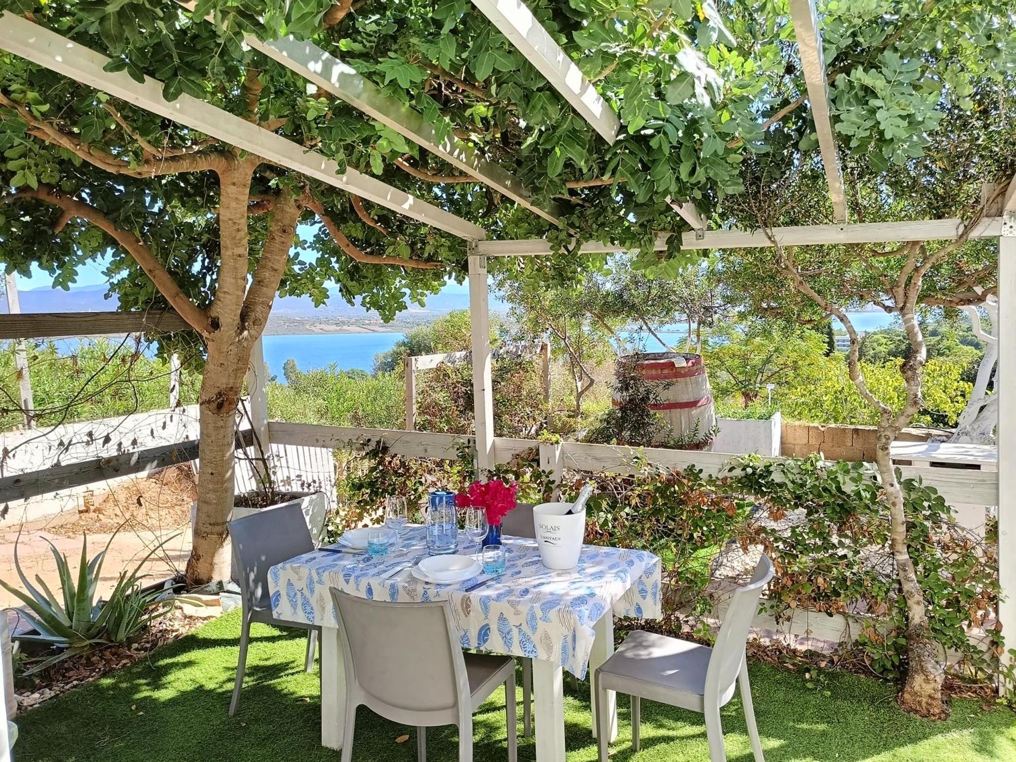Panohome Porto Pino Buitenkant foto